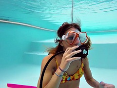 One of the hottest girls Katya Nakolkina in the pool