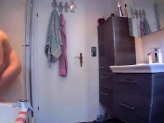 Amateur teen with a lovely ass takes a shower on hidden cam