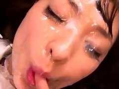 Kinky Japanese babe getting her pretty face covered in cum